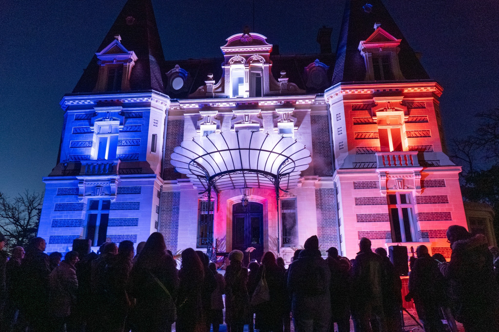 Illuminated venue during a business evening event in Paris